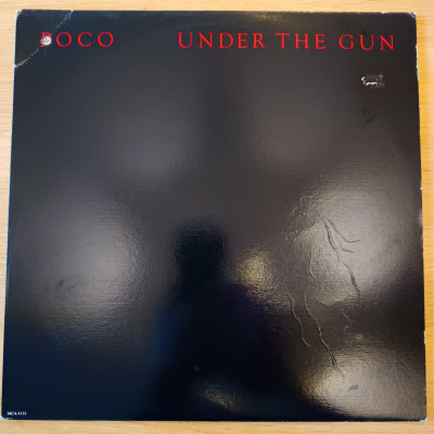 POCO UNDER THE GUN.jpg
