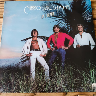 EMERSON LAKE AND PALMER LOVE BEACH.jpeg