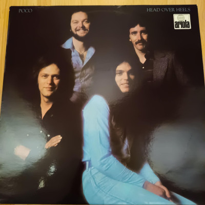 POCO HEAD OVER HEADS.jpg