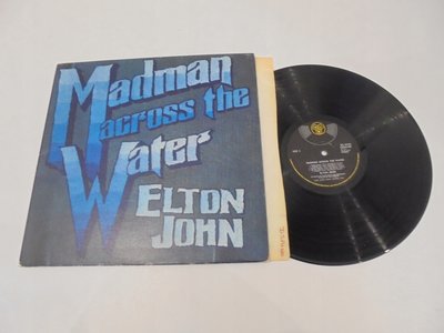 ELTON-JOHN-Madman-UK-EX-1PRESS-BOOKLET.jpg