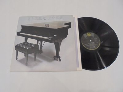 ELTON-JOHN-Here-and-three-UK.jpg